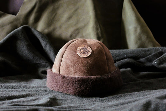 Bonnet shearling patch soleil, vue de face, peau de mouton retournée taille M/L