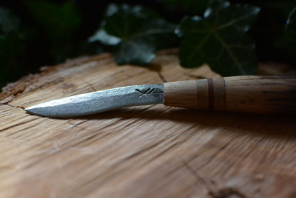 Détail de la lame et poinçon du forgeron
